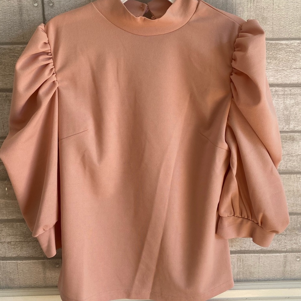 Pink puffy sleeve shirt